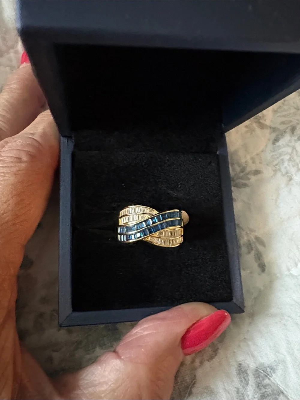 Gold-tone Wave Ring with Blue and Clear Stones